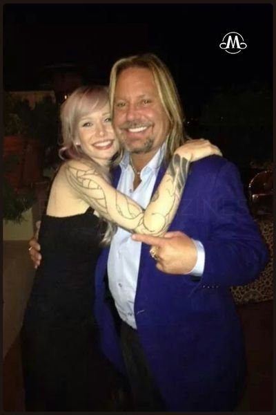 With Father Vince Neil